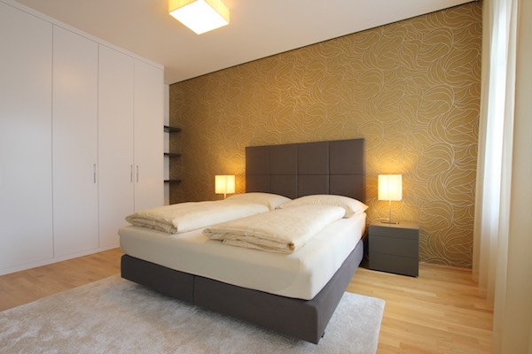 Schlafzimmer des möblierten Designapartments Penzing